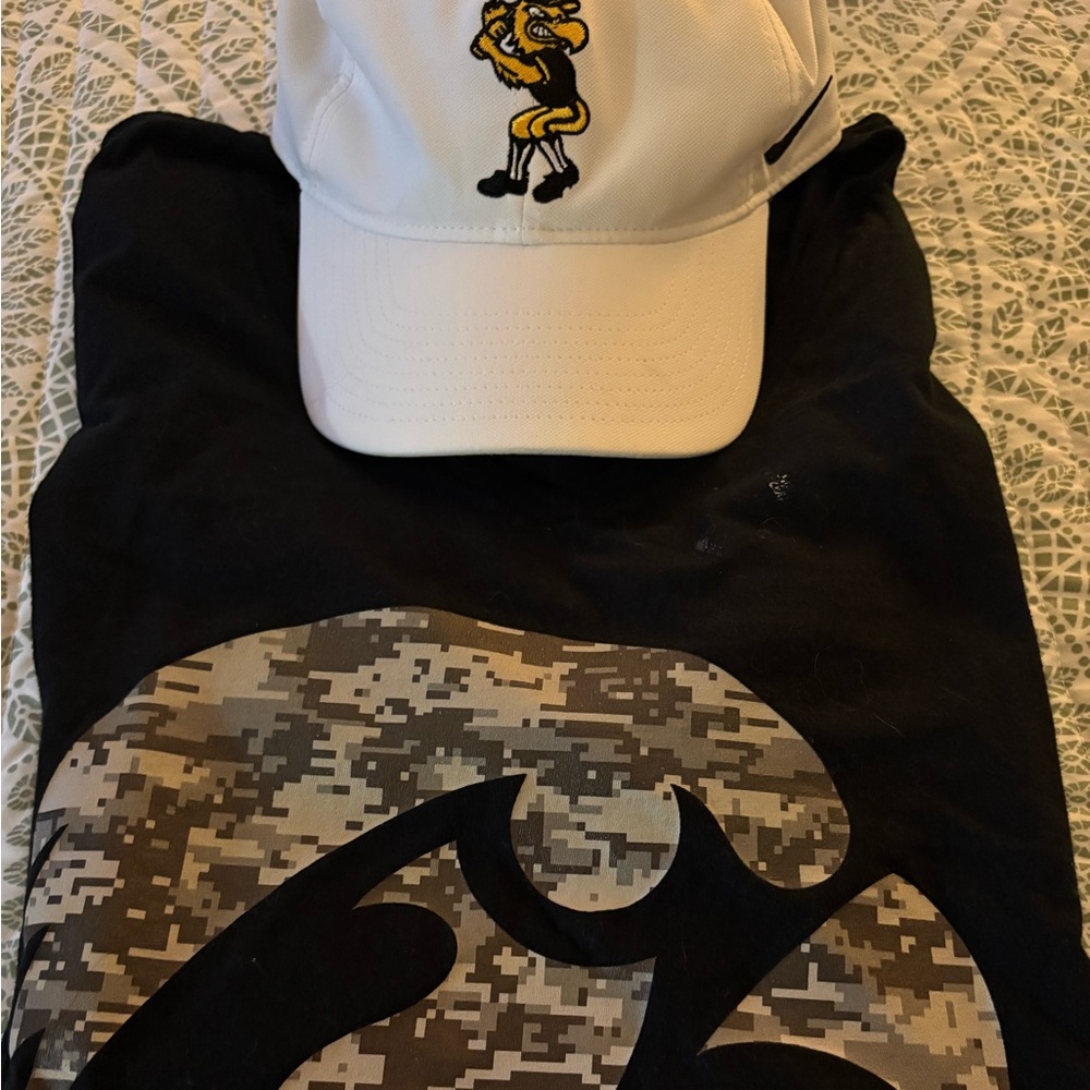 White Nike Iowa Hawkeye Cap with Black Camo Graphic Tee from Fanatics